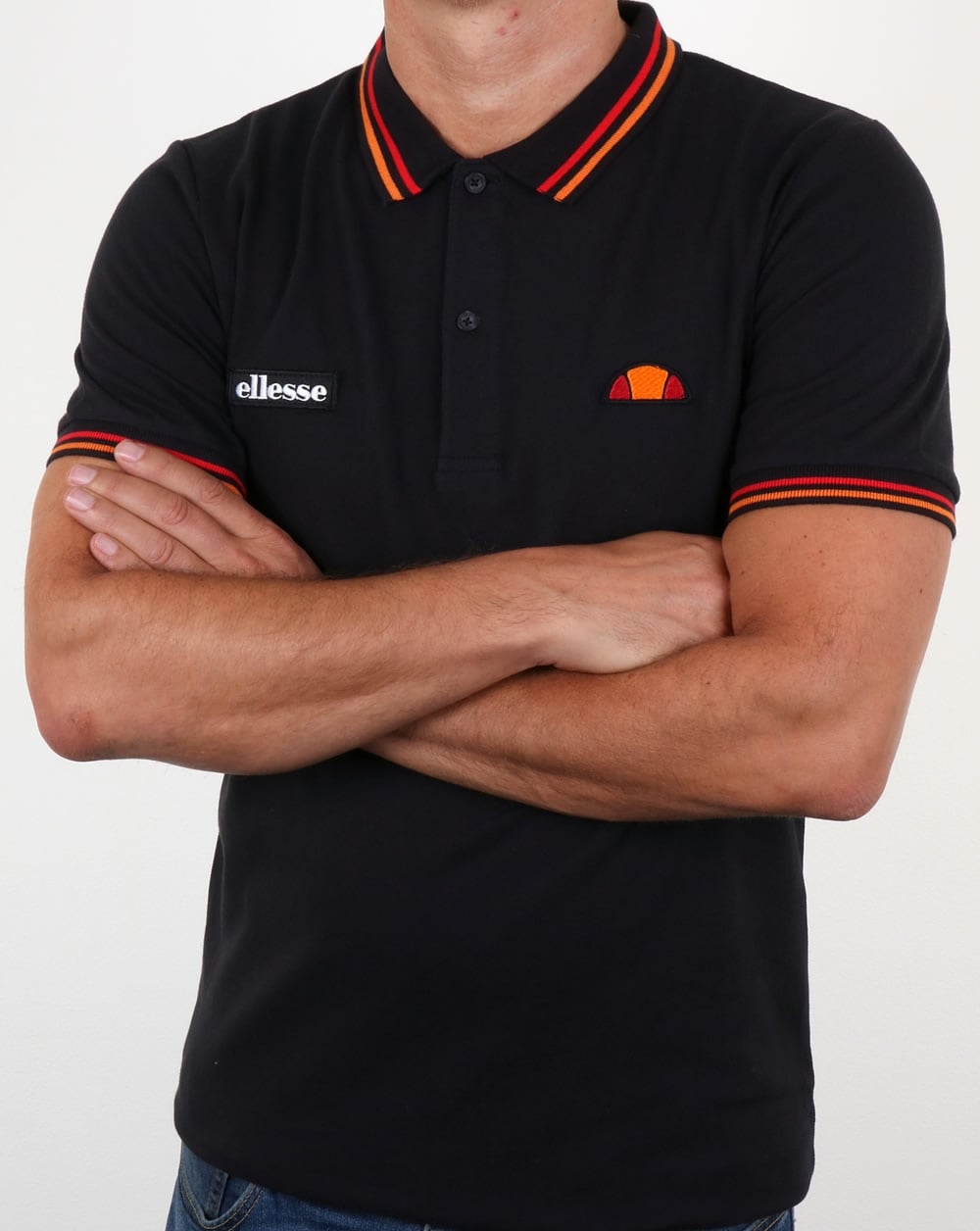 Ellesse – Rimini – Poloshirt mit Zierstreifen in Schwarz
