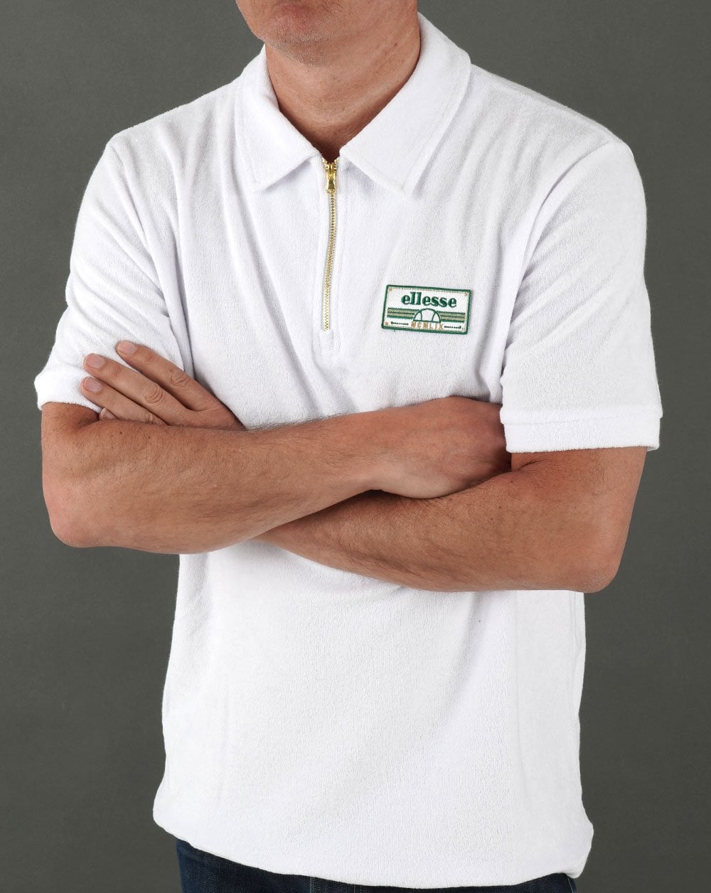 Ellesse – Frottee-Poloshirt mit Reißverschluss in Weiß