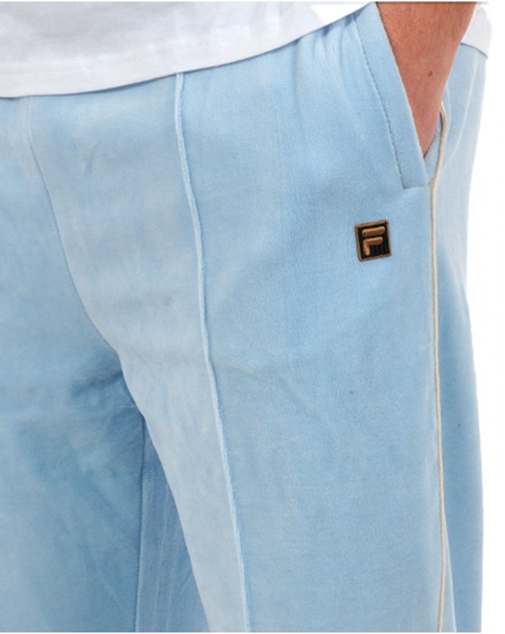 Fila – Trainingshose aus Velours mit goldener Paspelierung in Himmelblau