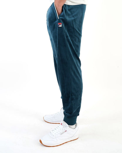 Fila – Vintage-Trainingshose aus Velours in Dunkelblaugrün